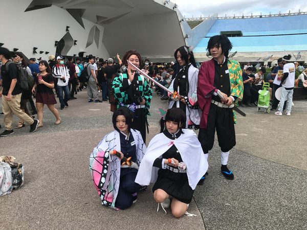 demon-slayer-cosplay-flickr-ccby-600px.jpg Group cosplay of Demon Slayer characters Tanjiro, Shinobu, Kanao, and others at an anime convention.